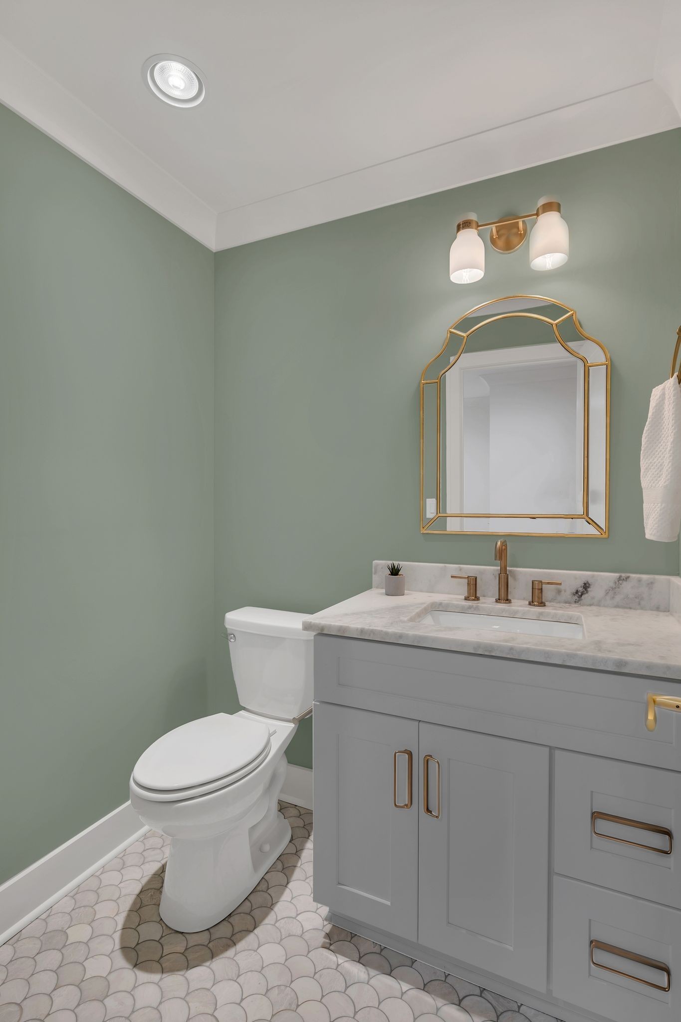 5441 Wakefield Drive Nashville, TN 37220 - Photo 44 of 72 a bathroom with a toilet sink and mirror