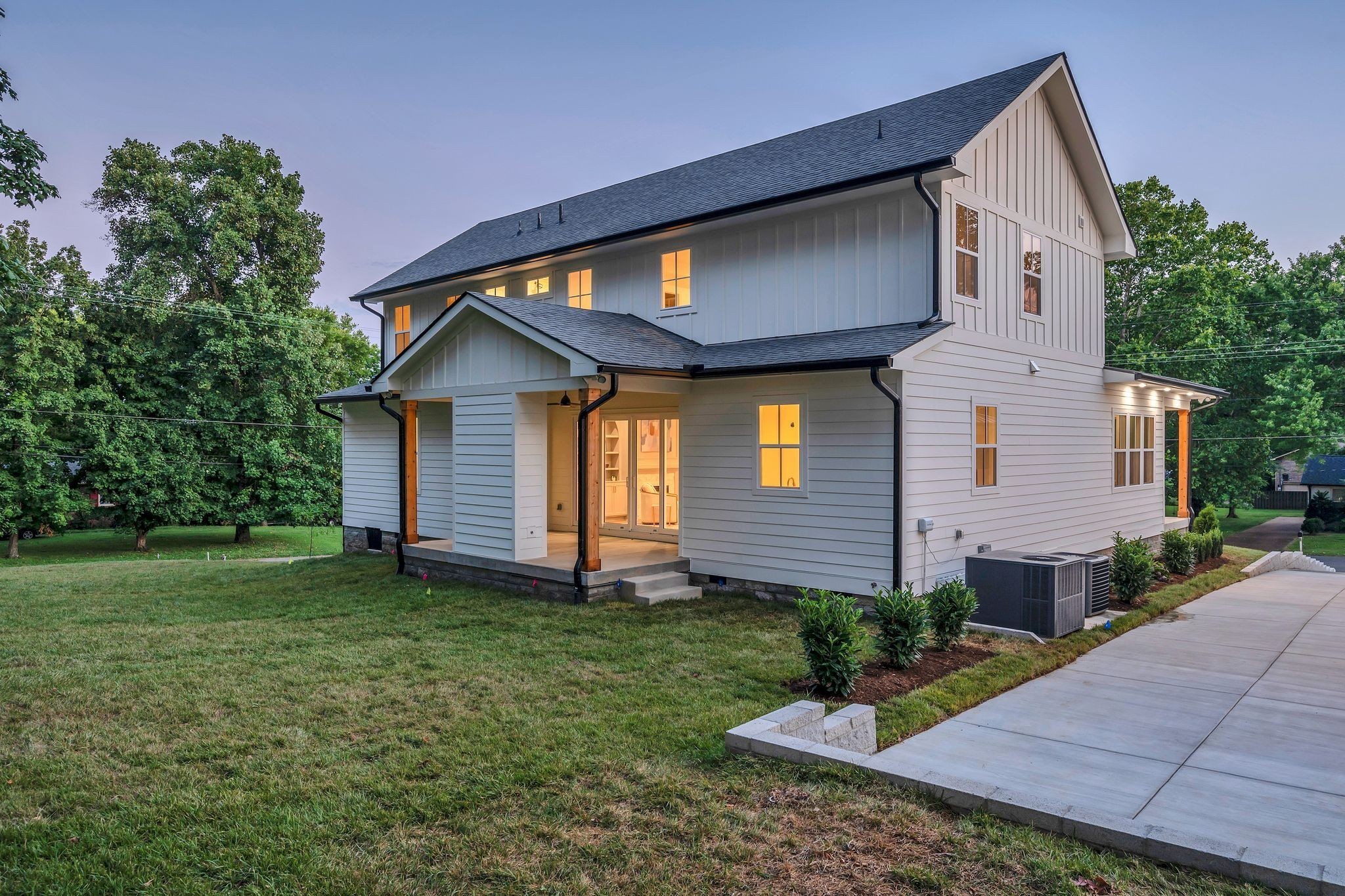 5441 Wakefield Drive Nashville, TN 37220 - Photo 64 of 72 a front view of a house with a yard and porch