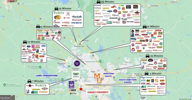 a utility room with fridge and wall