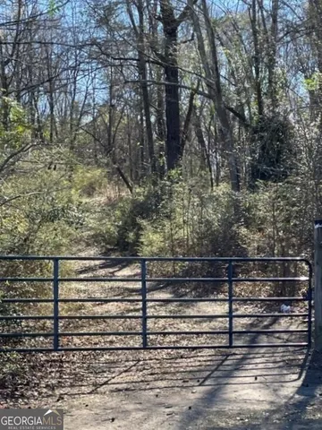 a view of a street with a building in the background
