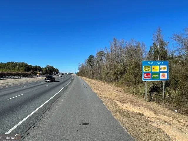 a view of street with cars