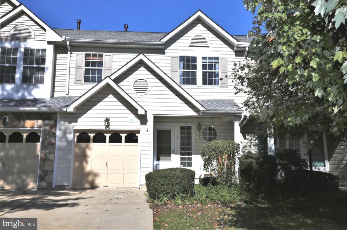 36 Castleton Road Princeton, NJ 08540 - Photo 1 of 5 a front view of a house with a yard
