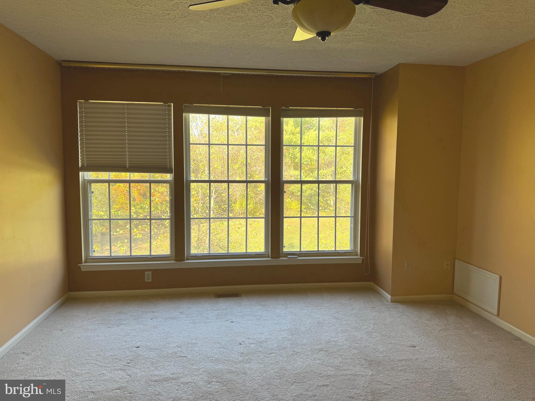 36 Castleton Road Princeton, NJ 08540 - Photo 5 of 5 a view of an empty room with a window