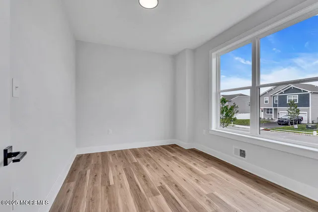 a view of a room that has a window in it