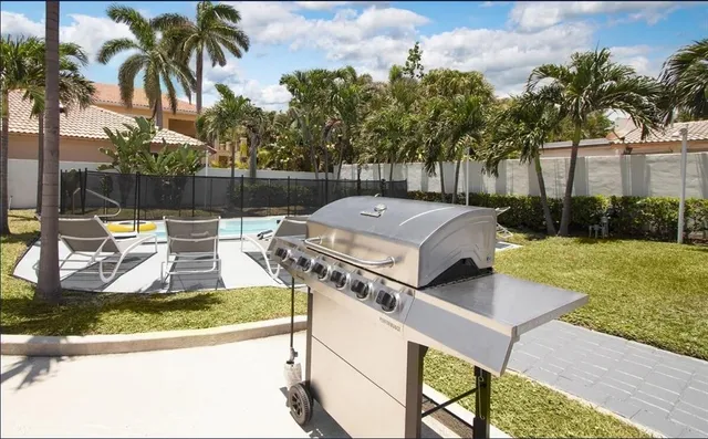 a bedroom with two beds and a window