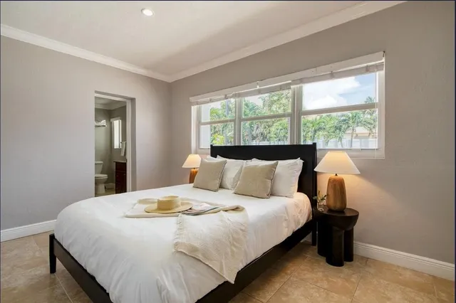 a living room with furniture fireplace and a flat screen tv