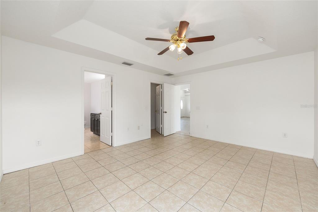 15434 Southwest 23rd Court Road Ocala, FL 34473 - Photo 24 of 41 a view of a livingroom with a ceiling fan and window