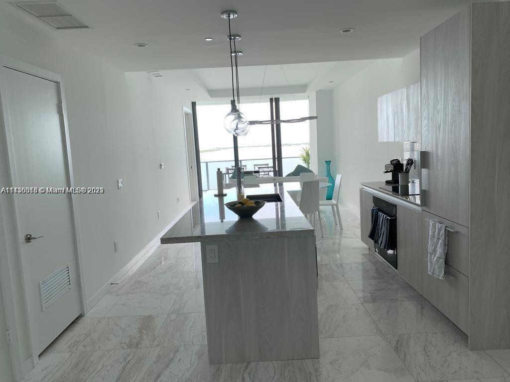 Paraiso Bay Miami, FL 33137 - Photo 5 of 9 a dining room with furniture and window