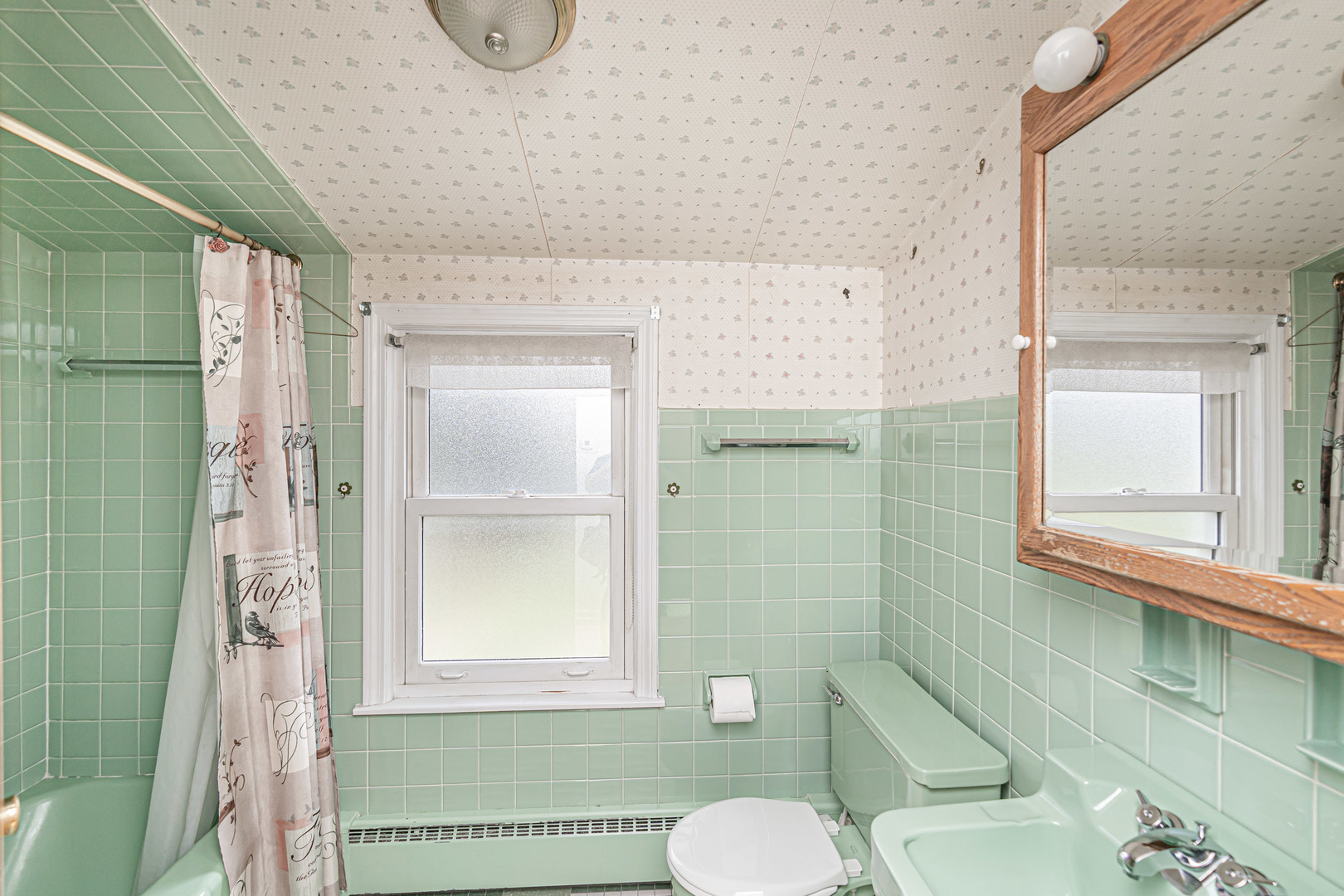 1001 Oakton Street Park Ridge, IL 60068 - Photo 15 of 33 a bathroom with a granite countertop bathtub sink vanity mirror and toilet