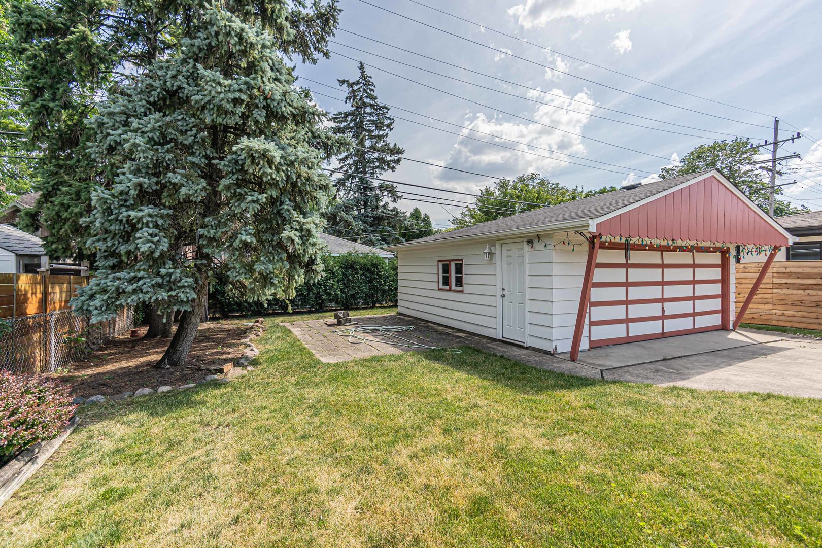 1001 Oakton Street Park Ridge, IL 60068 - Photo 24 of 33 a view of a backyard with white house