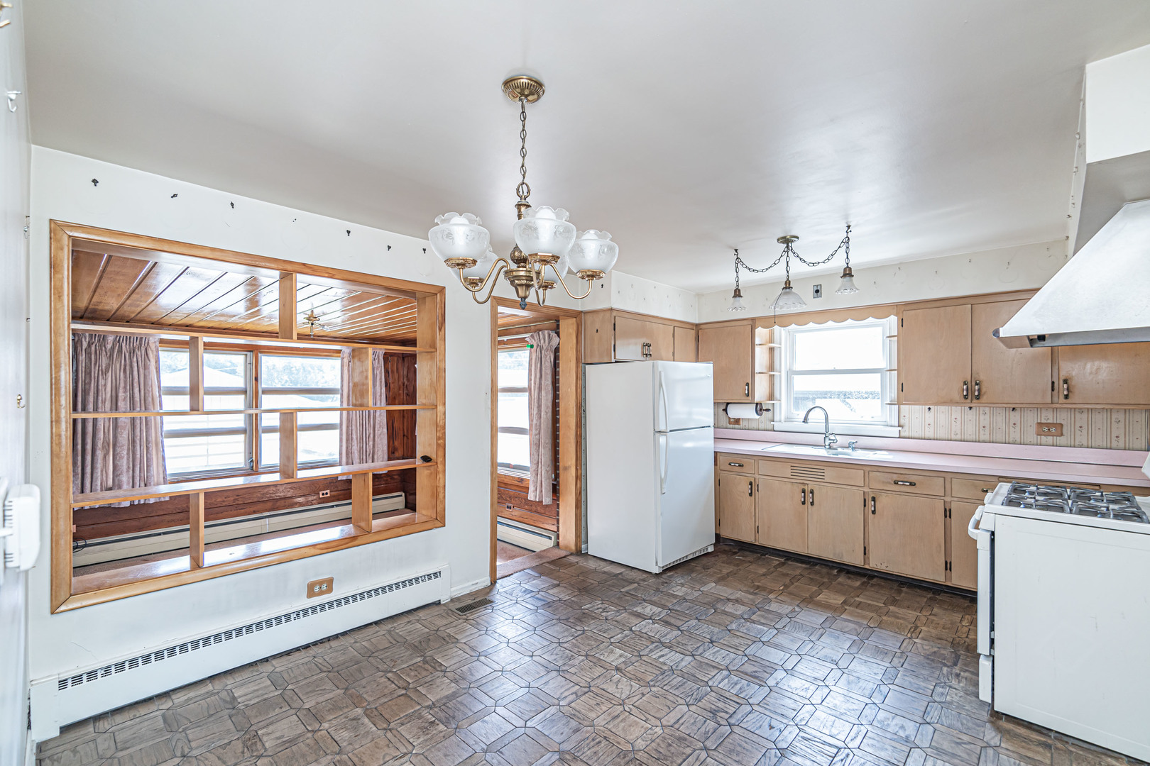 1001 Oakton Street Park Ridge, IL 60068 - Photo 5 of 33 a room with chandelier and fireplace