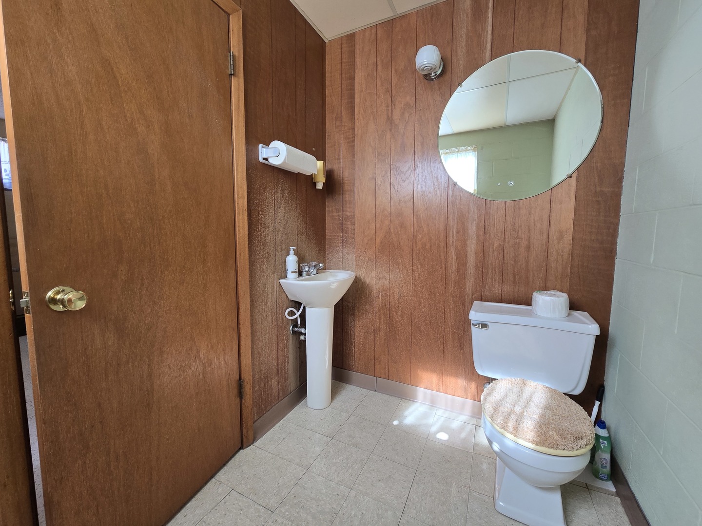 115 East Mason Street Polo, IL 61064 - Photo 5 of 6 a bathroom with a toilet and a mirror