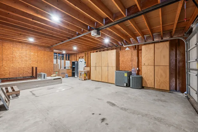 a view of a room with wooden walls