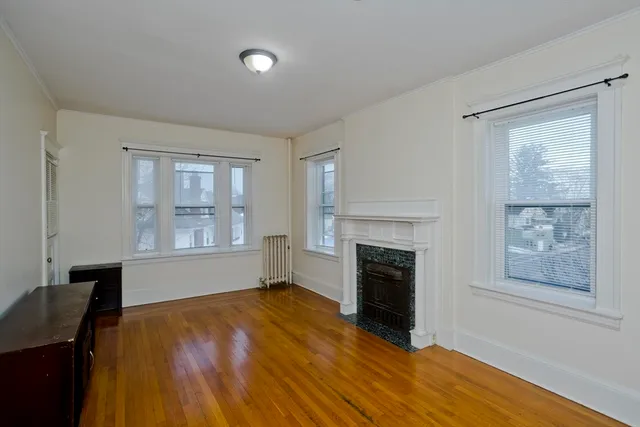 a kitchen with cabinets stove and sink