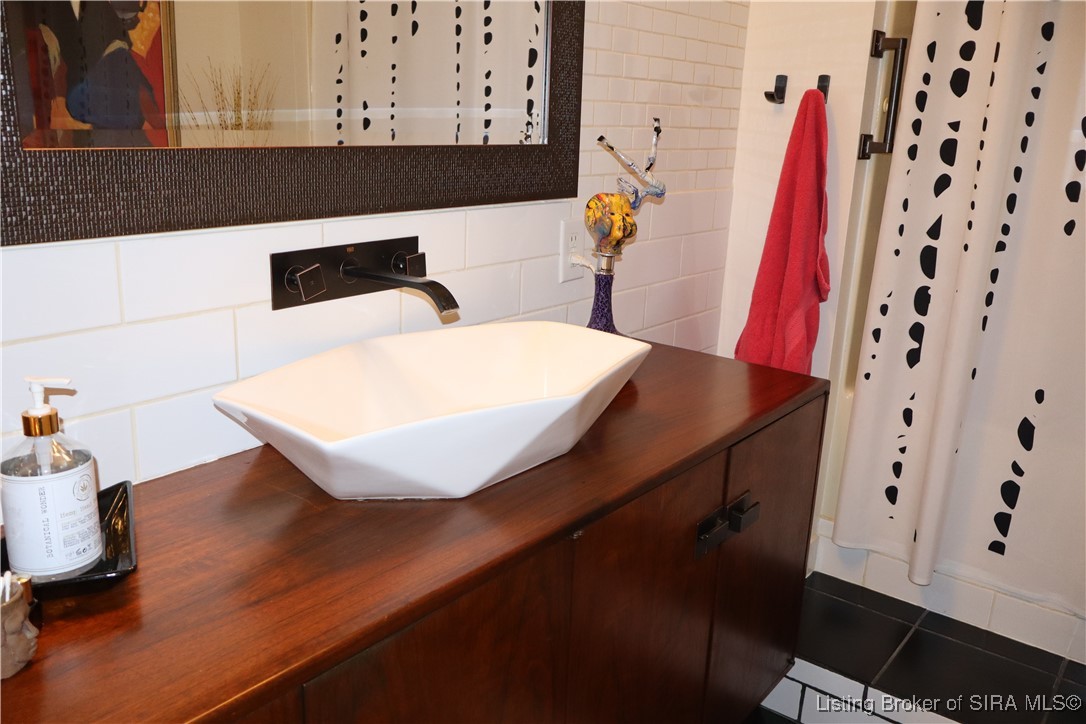 12906 West Polk Road Lexington, IN 47138 - Photo 48 of 49 Floating Cabinet w/ custom sink