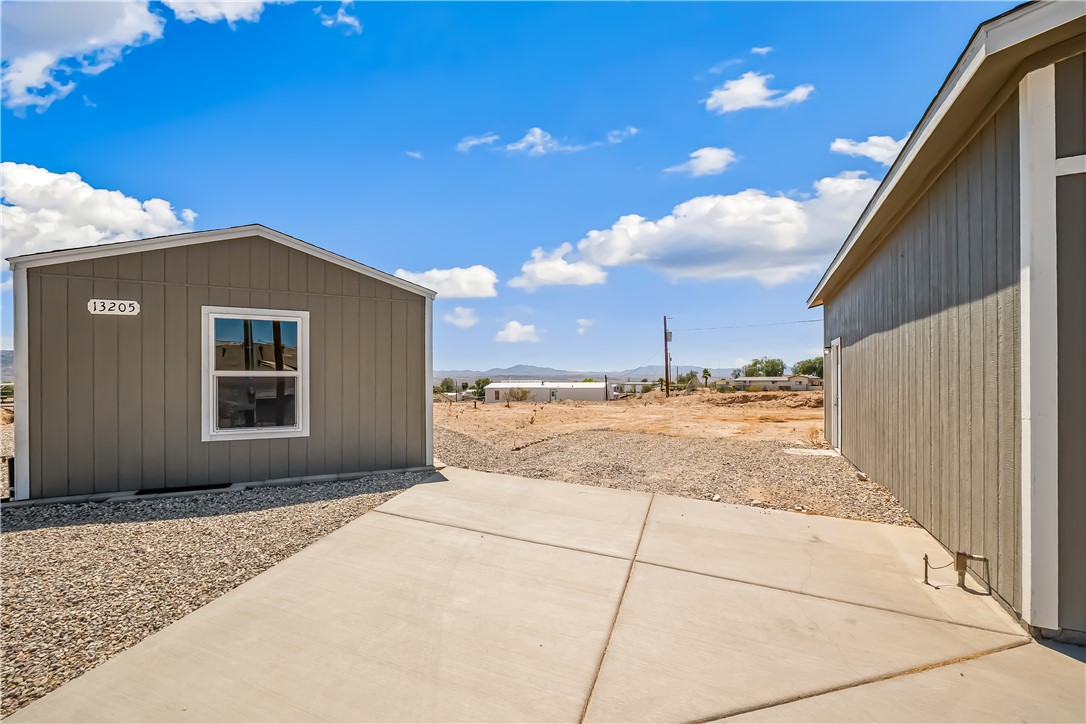 13205 South Water Reed Way Topock, AZ 86436 - Photo 10 of 37 a view of a house with a backyard