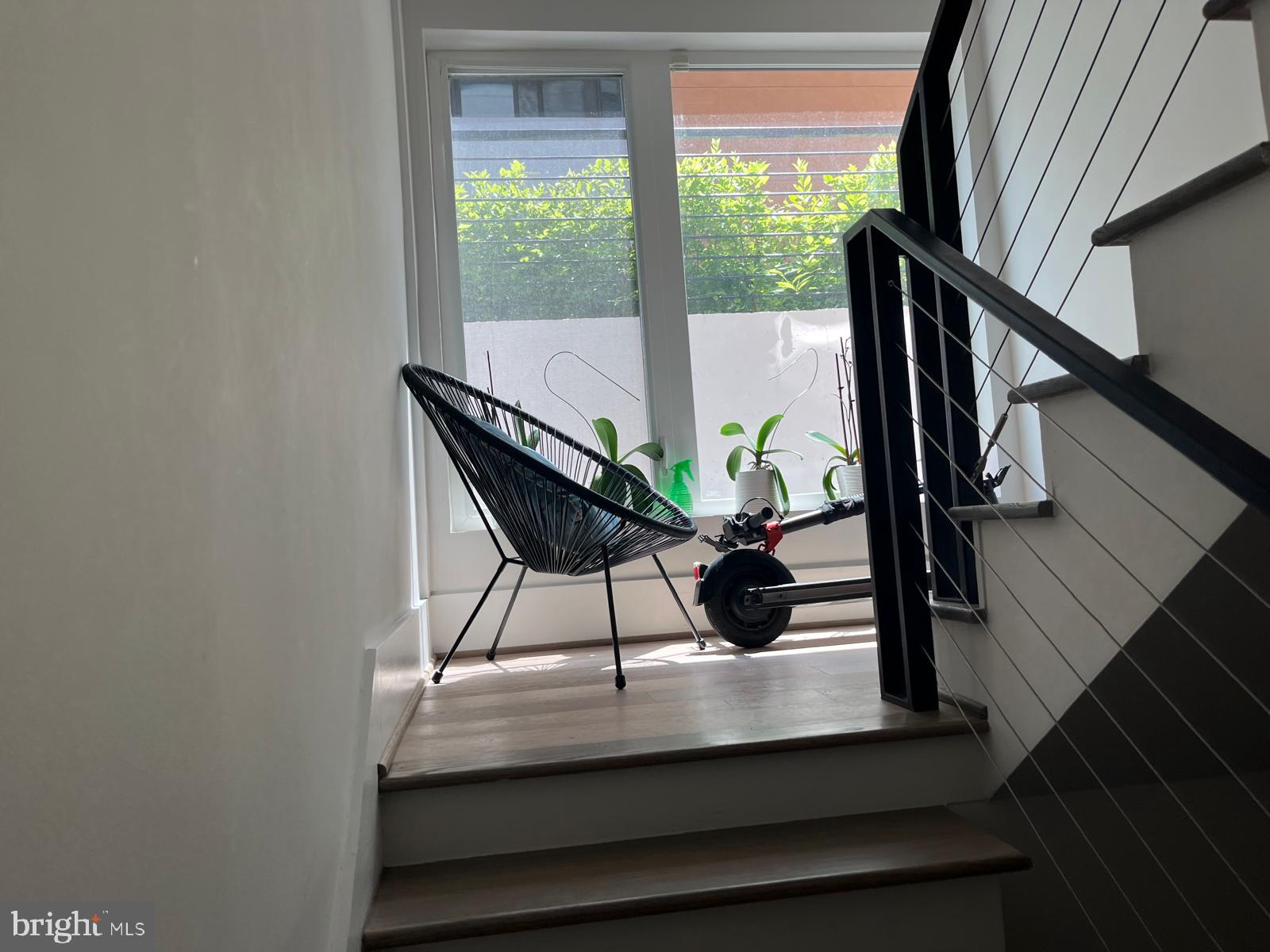 3919 Fulton Street Northwest, Unit 4 Washington, DC 20007 - Photo 16 of 31 a view of a balcony with chairs and a potted plant