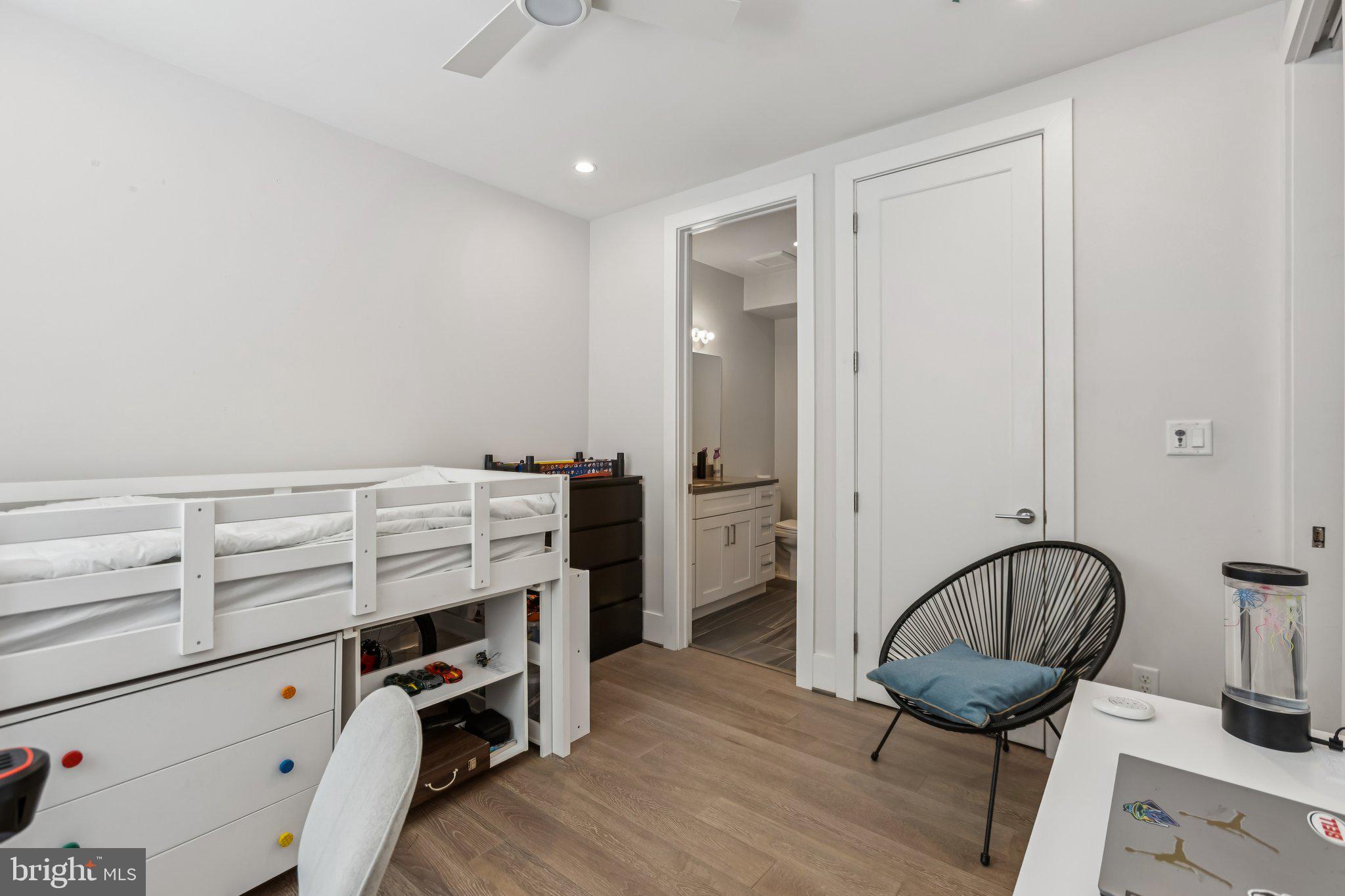 3919 Fulton Street Northwest, Unit 4 Washington, DC 20007 - Photo 25 of 31 a bathroom with a bathtub and a window