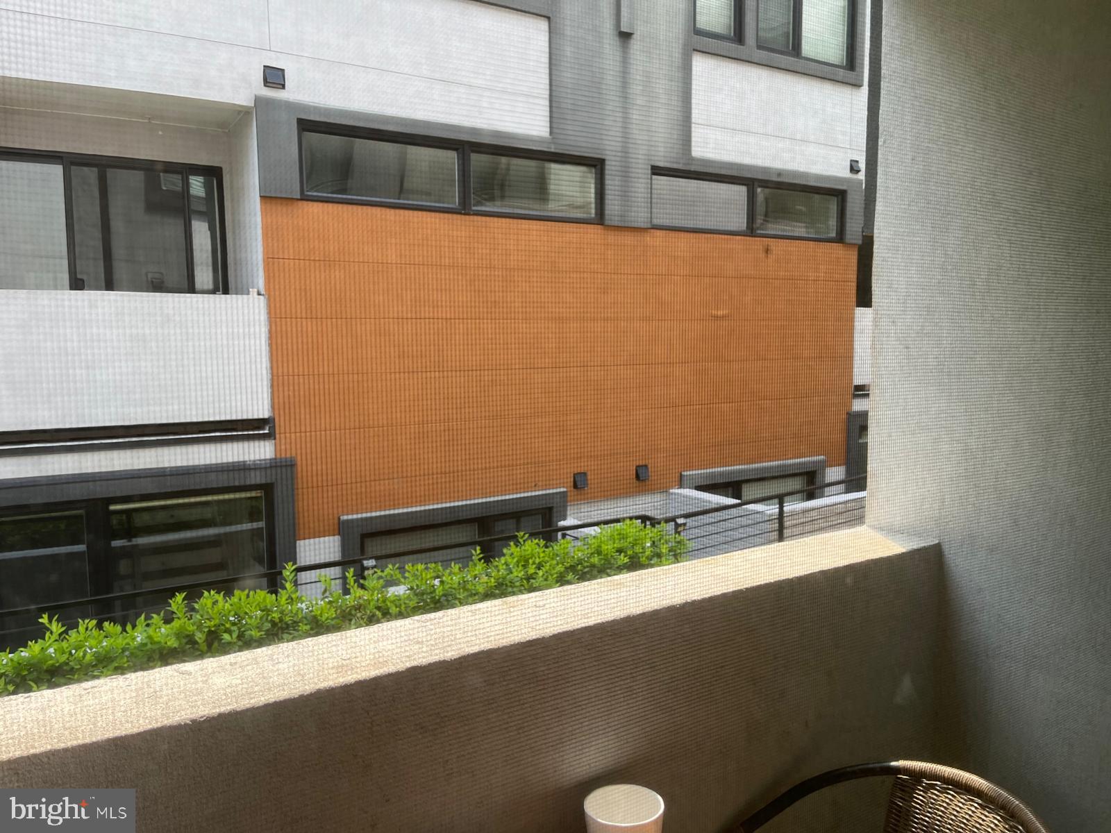 3919 Fulton Street Northwest, Unit 4 Washington, DC 20007 - Photo 29 of 31 a bathroom with a sink and a mirror