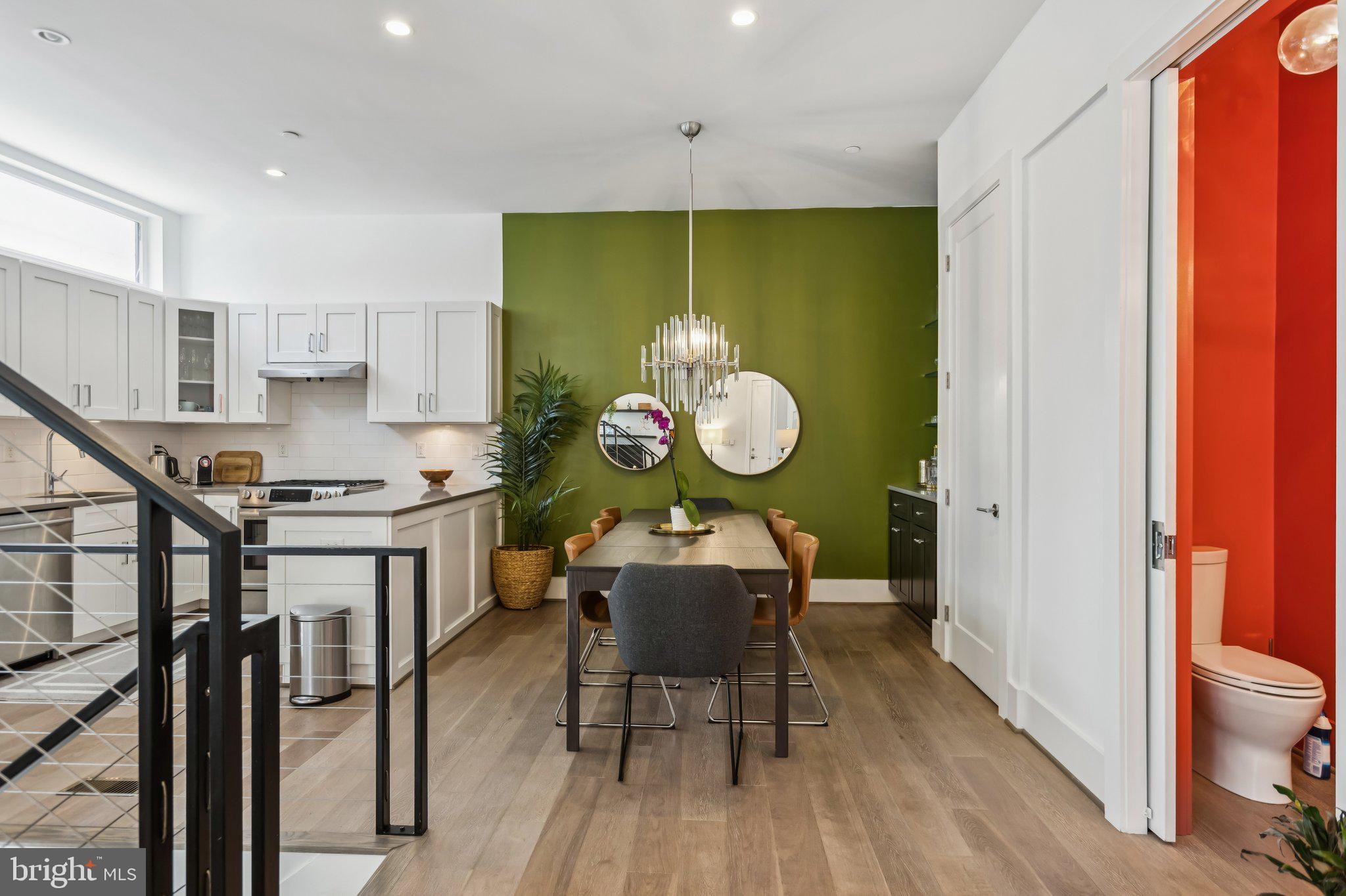 3919 Fulton Street Northwest, Unit 4 Washington, DC 20007 - Photo 5 of 31 a view of a dining room with furniture window and wooden floor