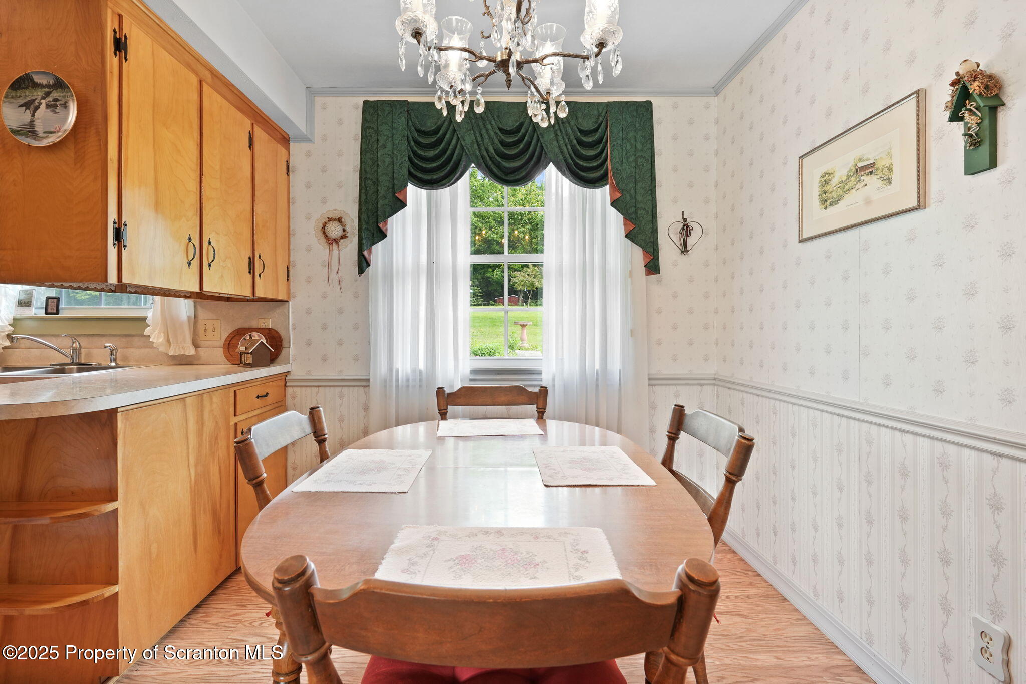 3374 Ridge Road Montrose, PA 18801 - Photo 11 of 31 a view of a dining room with furniture window and outside view