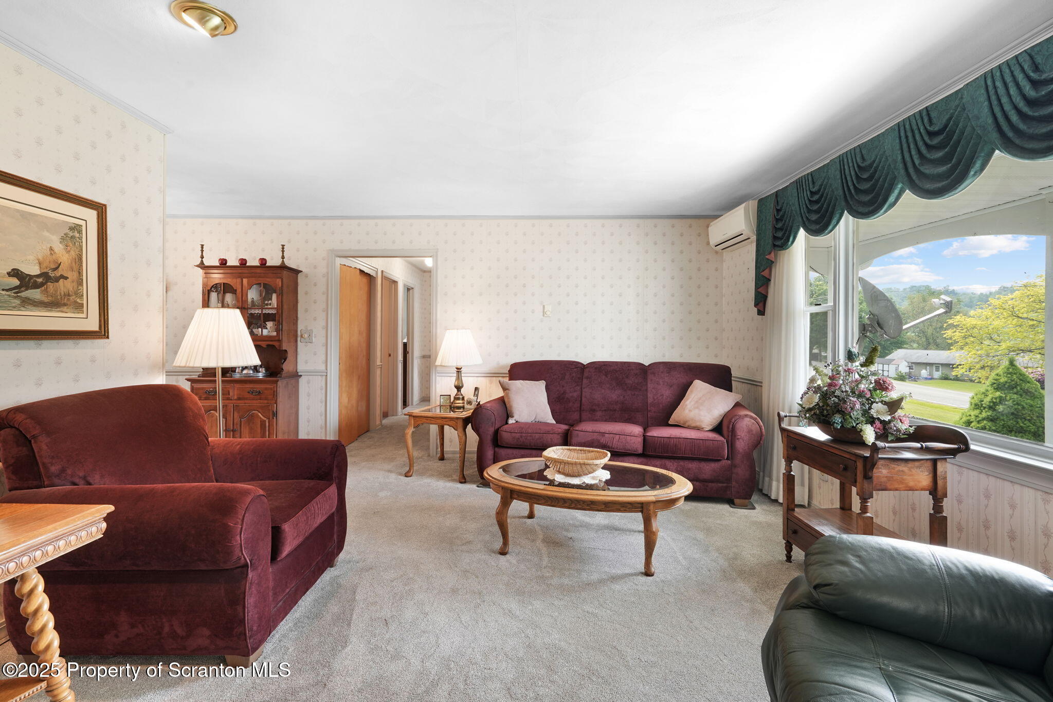 3374 Ridge Road Montrose, PA 18801 - Photo 14 of 31 a living room with furniture and a large window