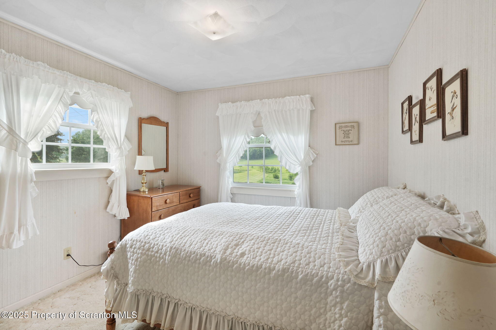 3374 Ridge Road Montrose, PA 18801 - Photo 21 of 31 a bedroom with a bed and a window