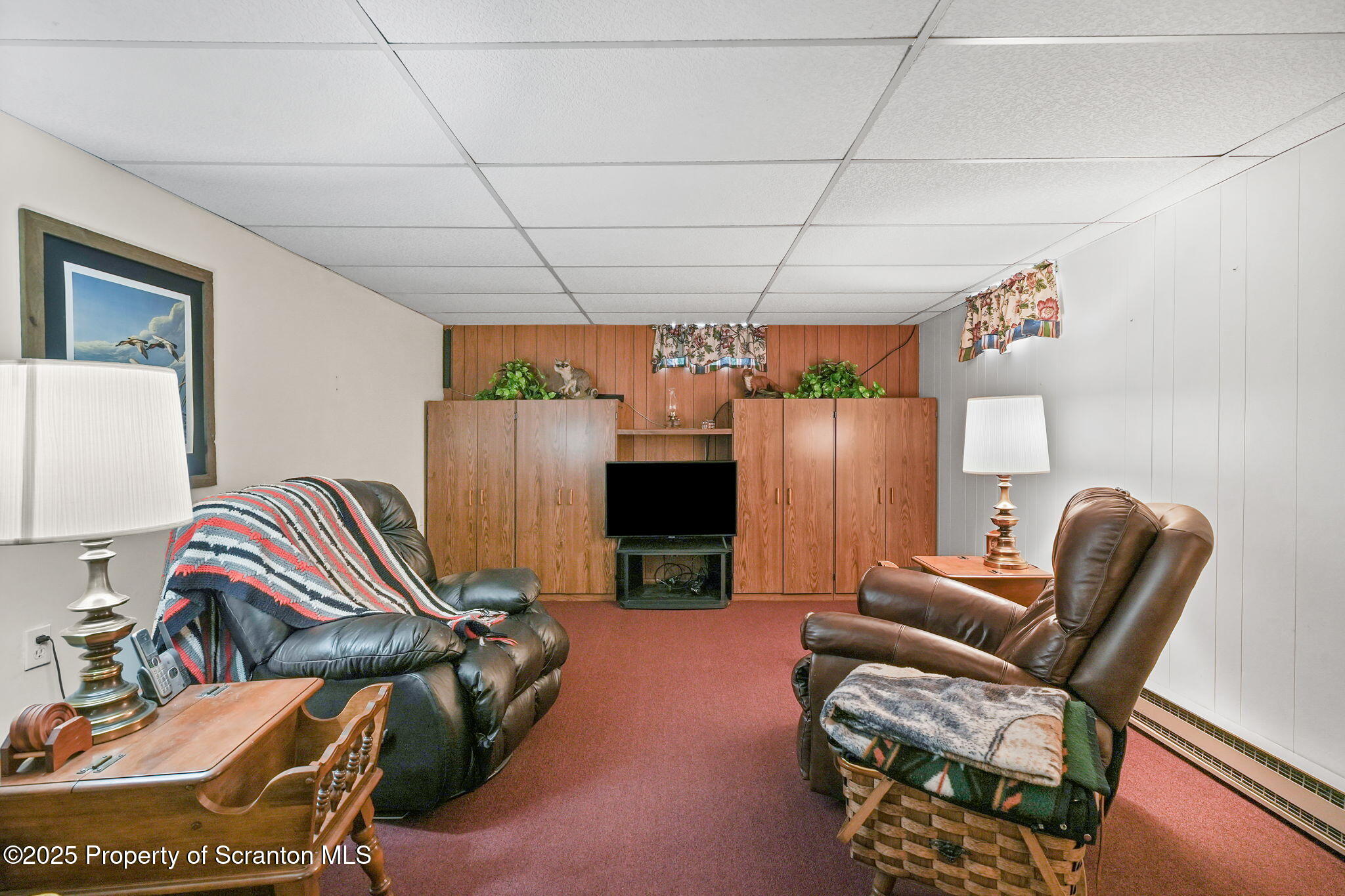 3374 Ridge Road Montrose, PA 18801 - Photo 22 of 31 a room with furniture and a flat screen tv