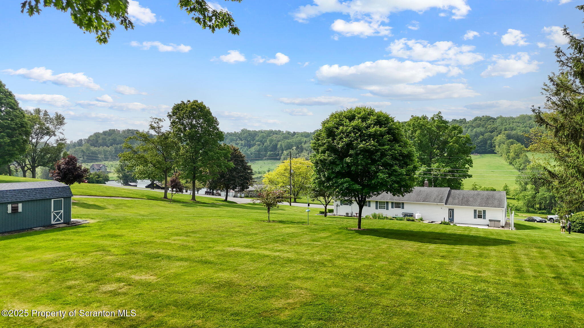 3374 Ridge Road Montrose, PA 18801 - Photo 5 of 31 a view of a park with large trees
