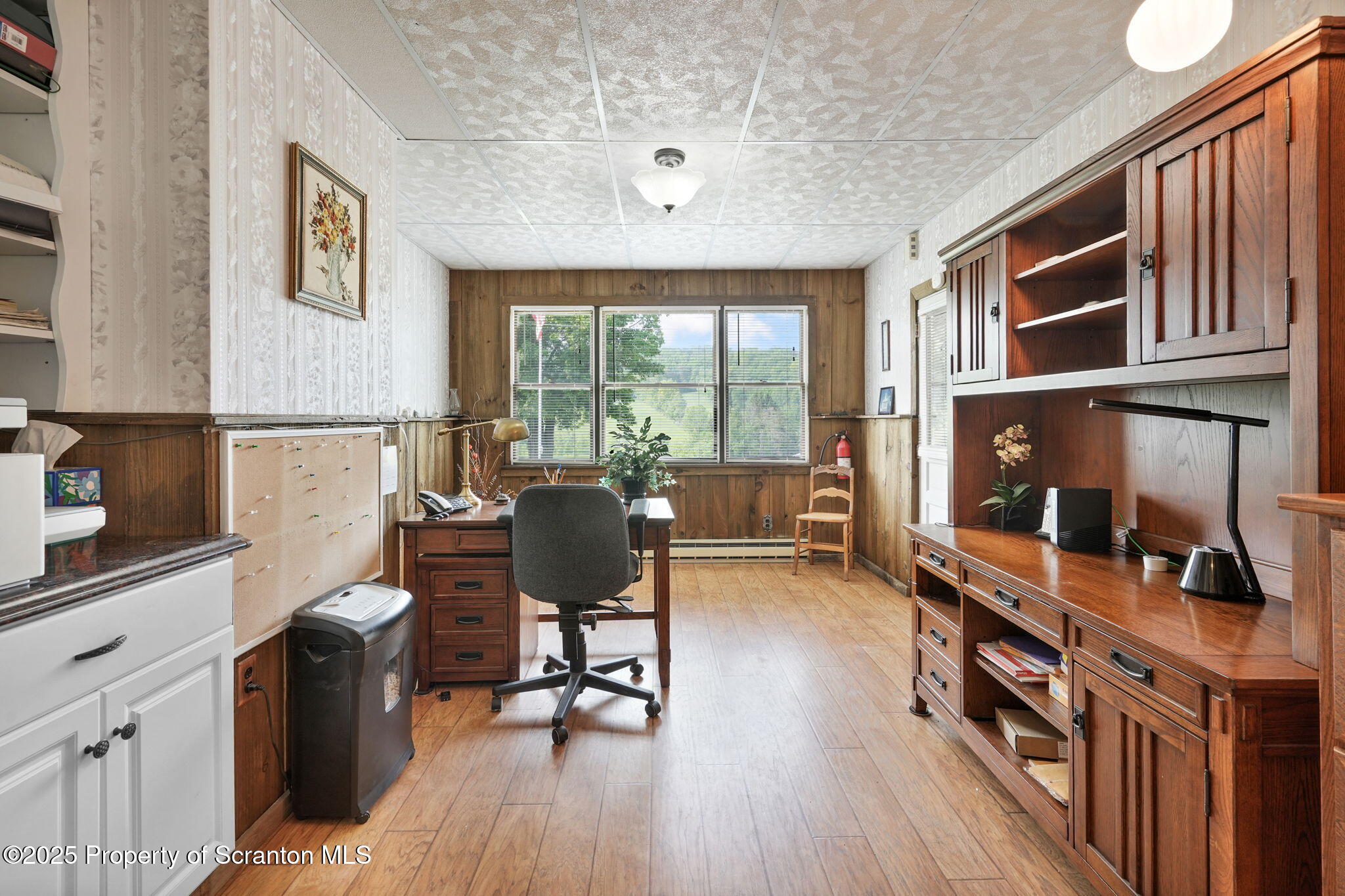 3374 Ridge Road Montrose, PA 18801 - Photo 7 of 31 a view of a workspace with furniture and a window