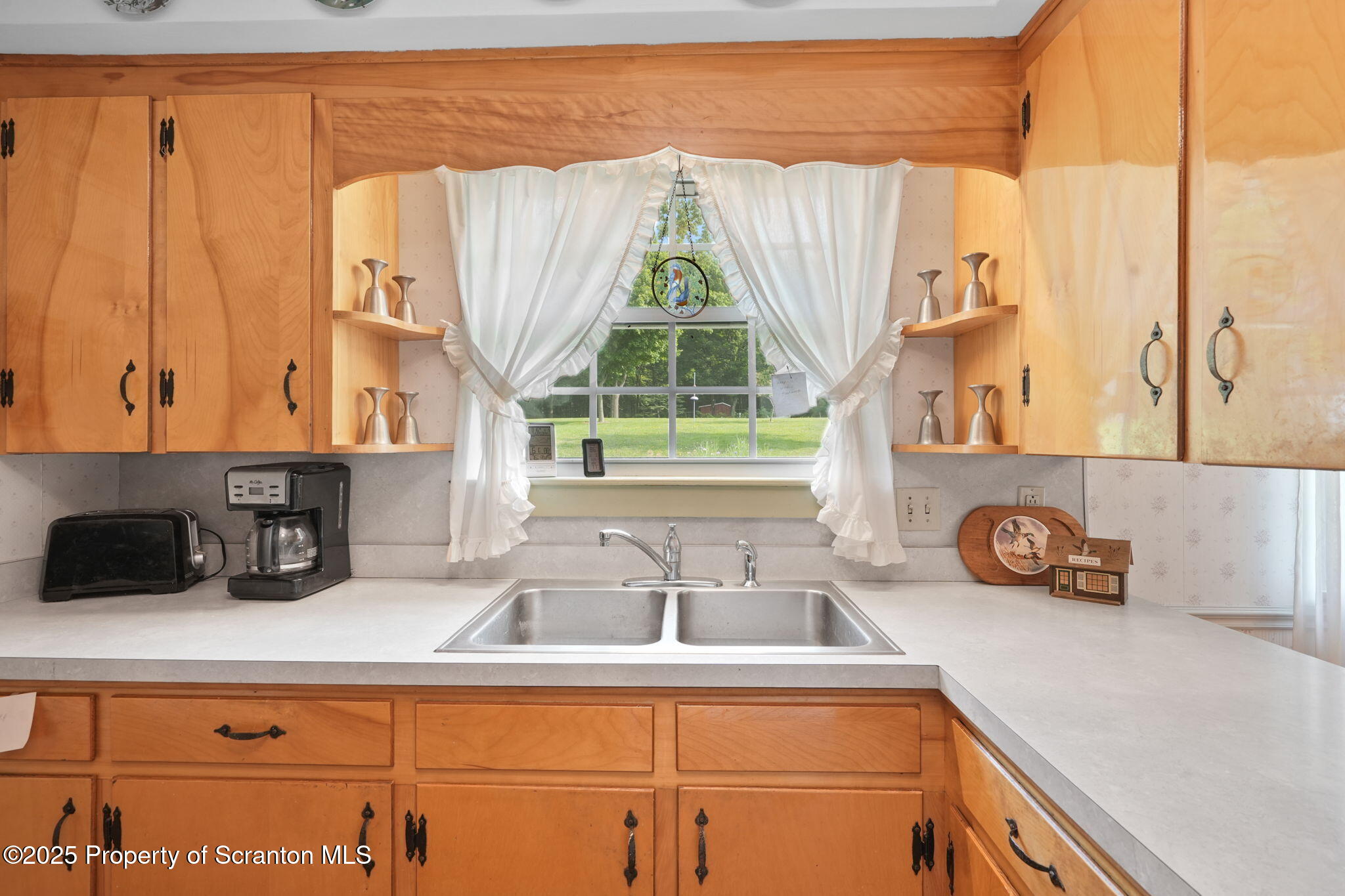 3374 Ridge Road Montrose, PA 18801 - Photo 10 of 31 a kitchen with a sink and a window