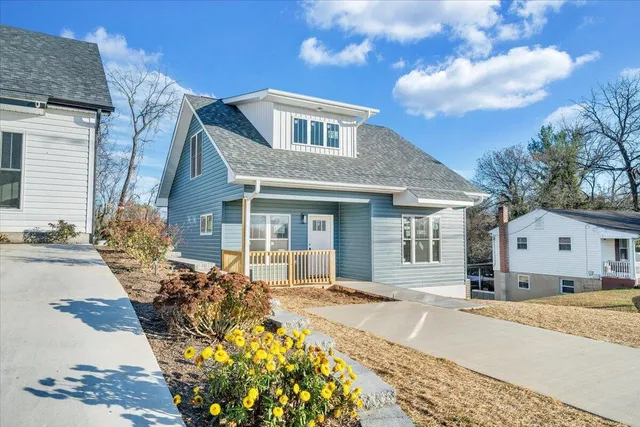 a front view of a house with a porch
