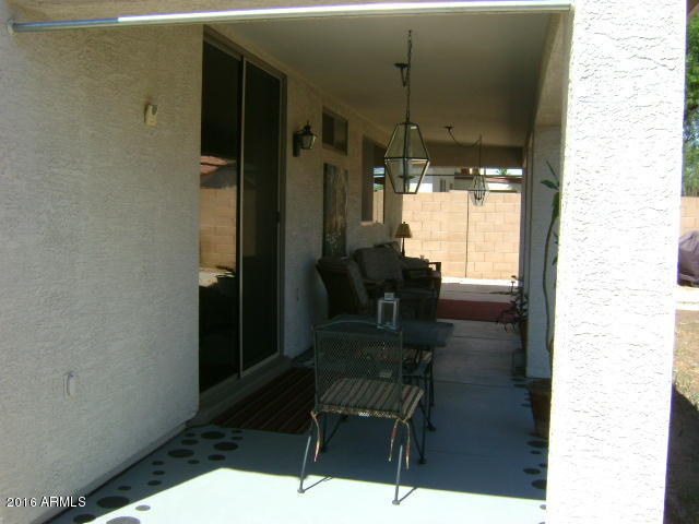 11174 West Berkeley Road Avondale, AZ 85392 - Photo 27 of 41 a dining room with furniture and a window