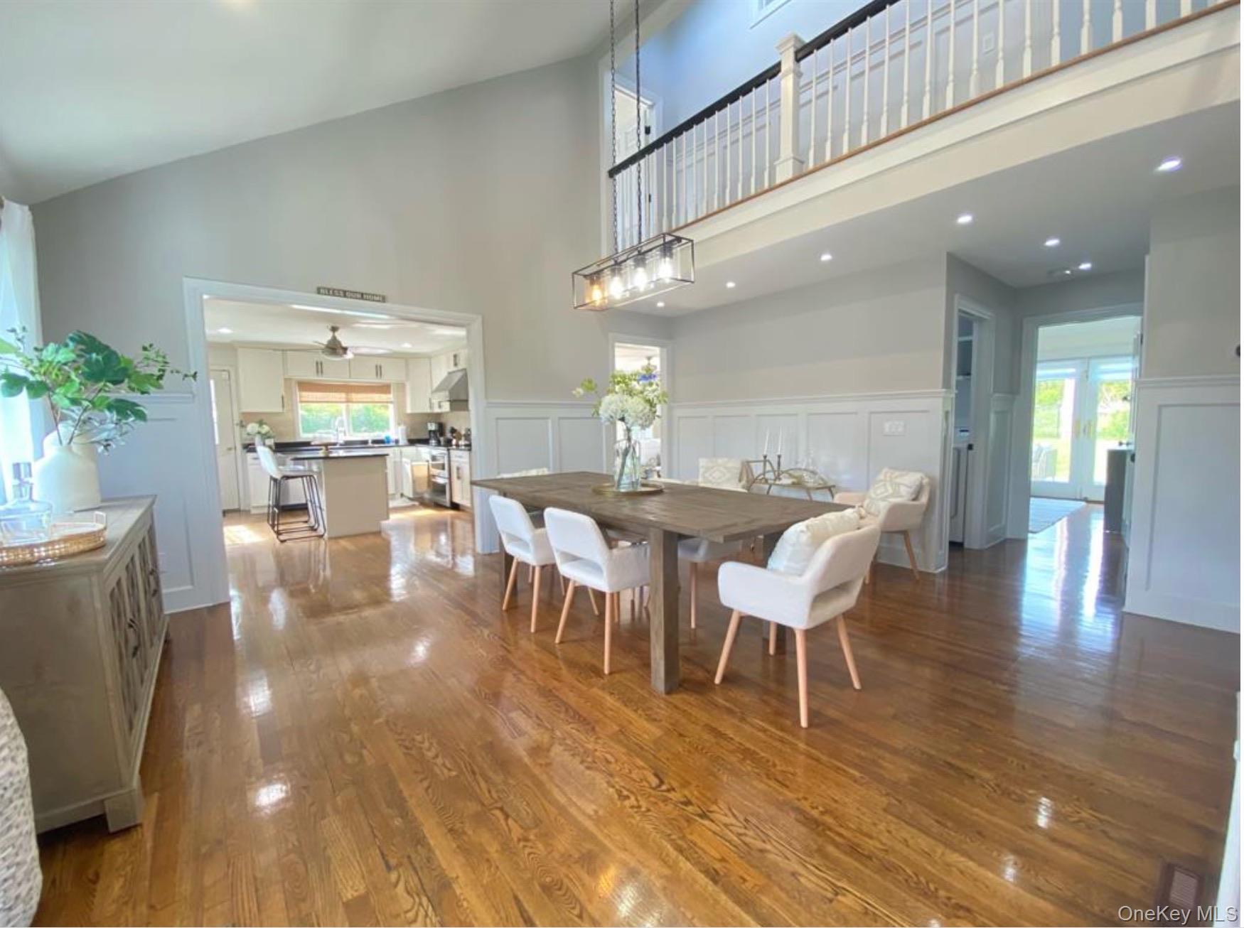 51 Cheviot Road Southampton, NY 11968 - Photo 4 of 22 a view of a dining room with furniture and wooden floor
