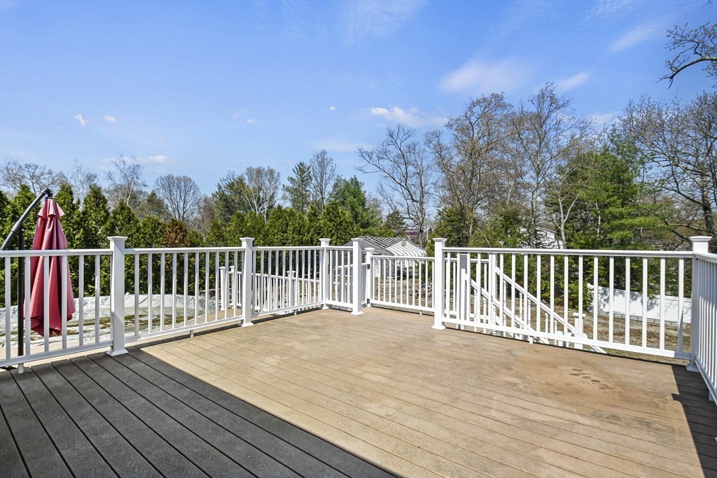 5 Jackson Road Webster, MA 01570 - Photo 28 of 30 a balcony with wooden floor and fence