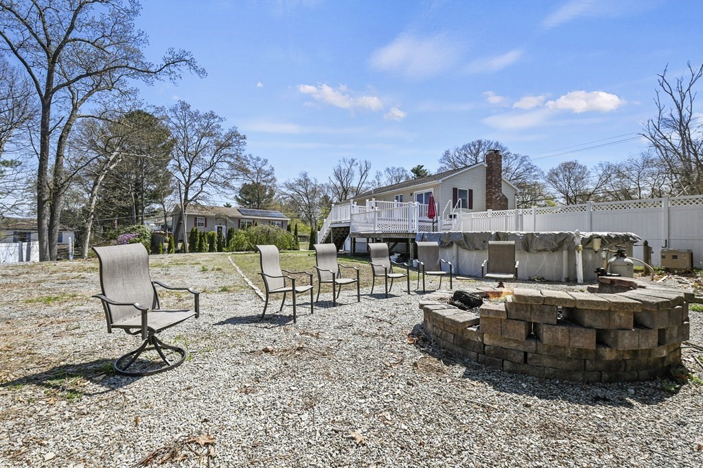 5 Jackson Road Webster, MA 01570 - Photo 30 of 30 a view of a swimming pool with chairs and table