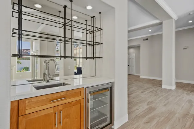 a kitchen with a refrigerator and countertop