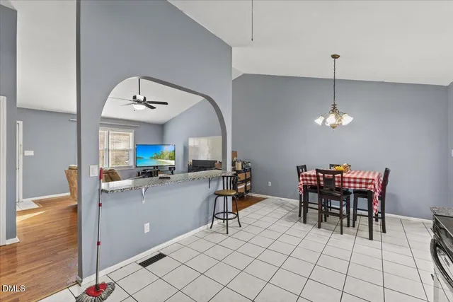 a view of a dining room with furniture
