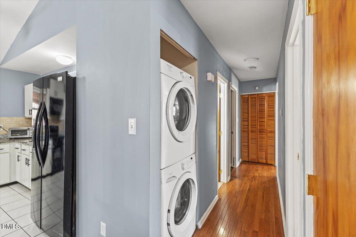 3612 Satellite Court Raleigh, NC 27604 - Photo 19 of 42 a view of a hallway with washer and dryer
