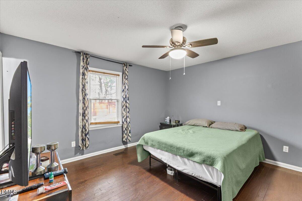 3612 Satellite Court Raleigh, NC 27604 - Photo 25 of 42 a bedroom with a bed and a window