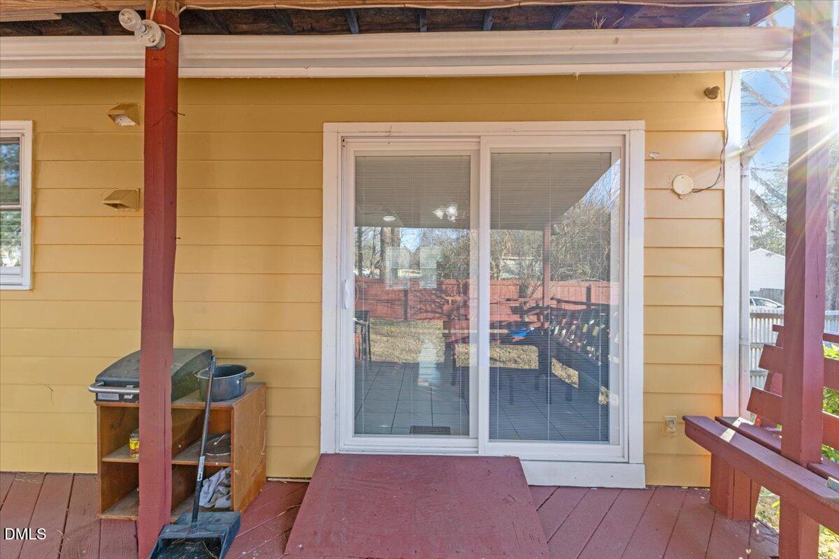 3612 Satellite Court Raleigh, NC 27604 - Photo 30 of 42 a view of a hallway with wooden floor and dining room view