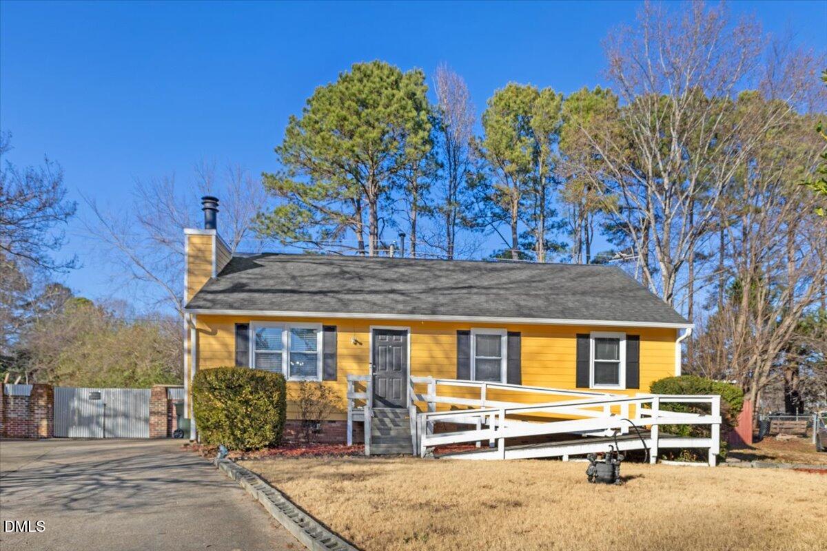 3612 Satellite Court Raleigh, NC 27604 - Photo 3 of 42 a front view of a house with garden