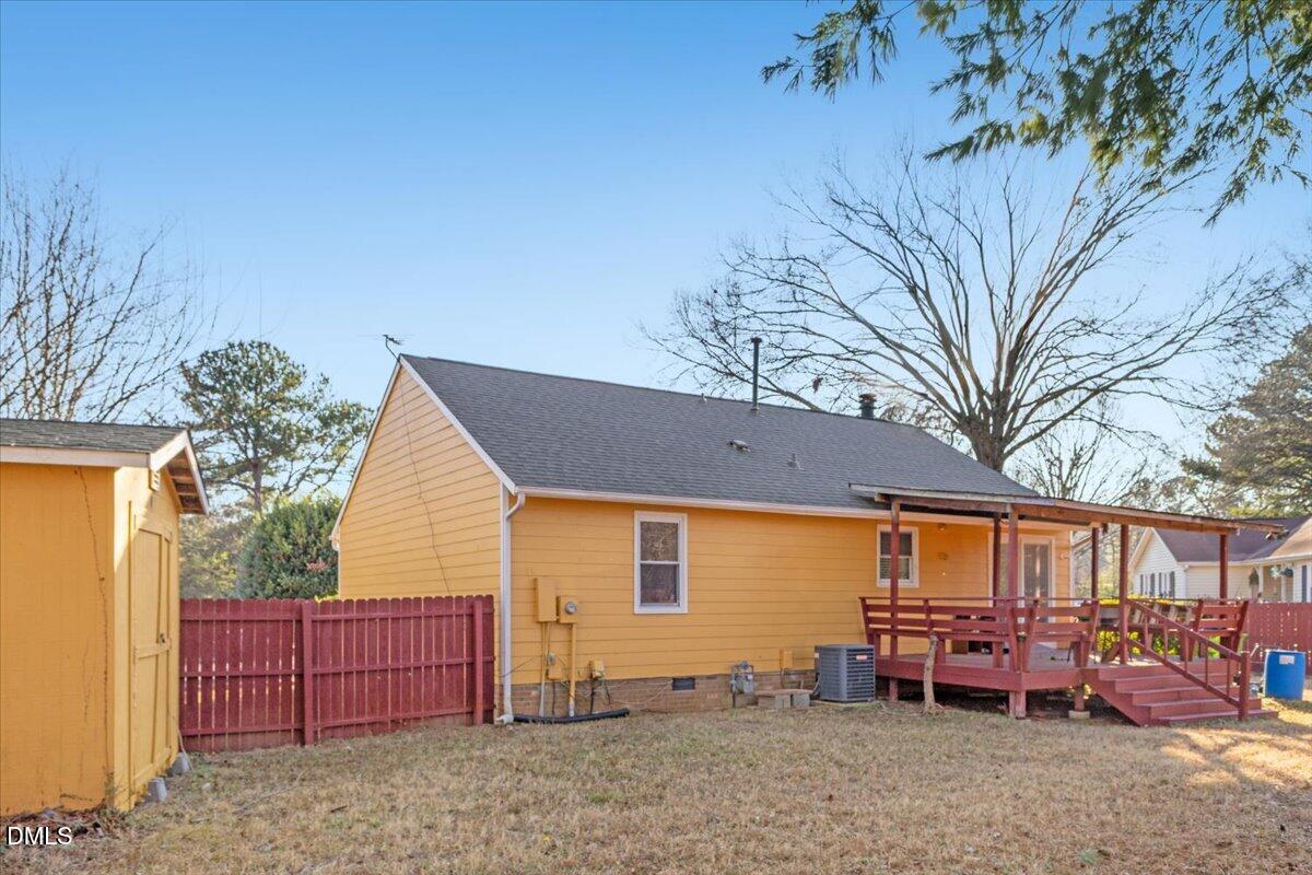 3612 Satellite Court Raleigh, NC 27604 - Photo 33 of 42 a backyard of a house with barbeque oven table and chairs