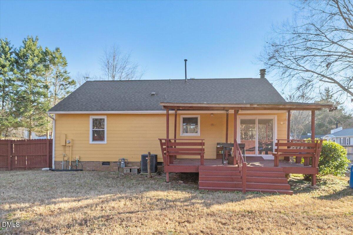 3612 Satellite Court Raleigh, NC 27604 - Photo 37 of 42 a front view of a house with a yard outdoor seating and covered with trees