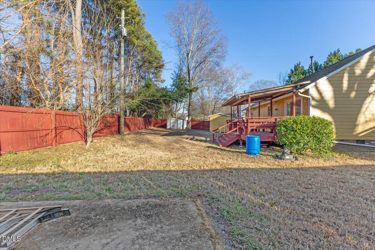 3612 Satellite Court Raleigh, NC 27604 - Photo 38 of 42 a view of a yard with wooden fence