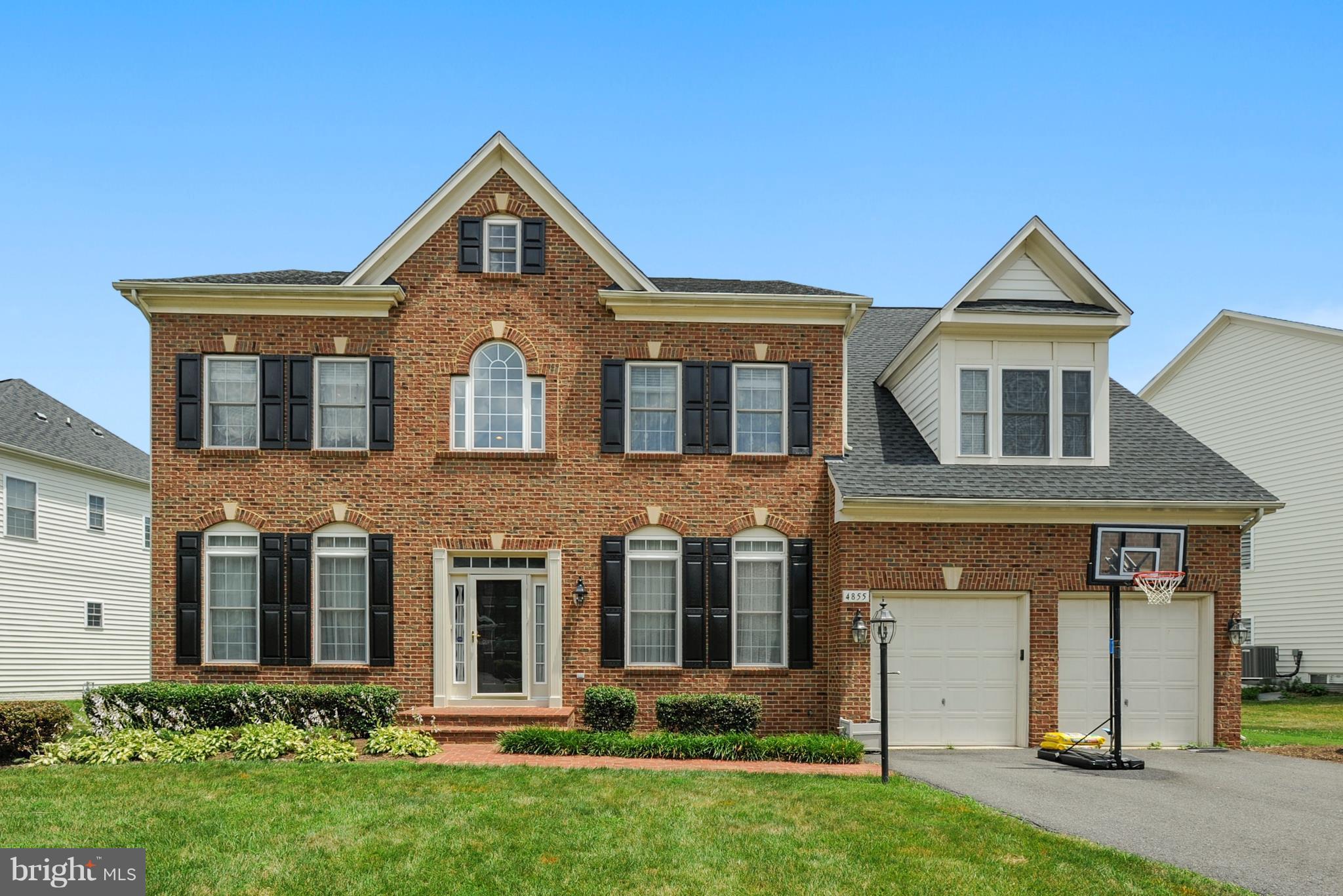 4855 Muddler Way Fairfax, VA 22030 - Photo 1 of 30 a front view of a house with a yard