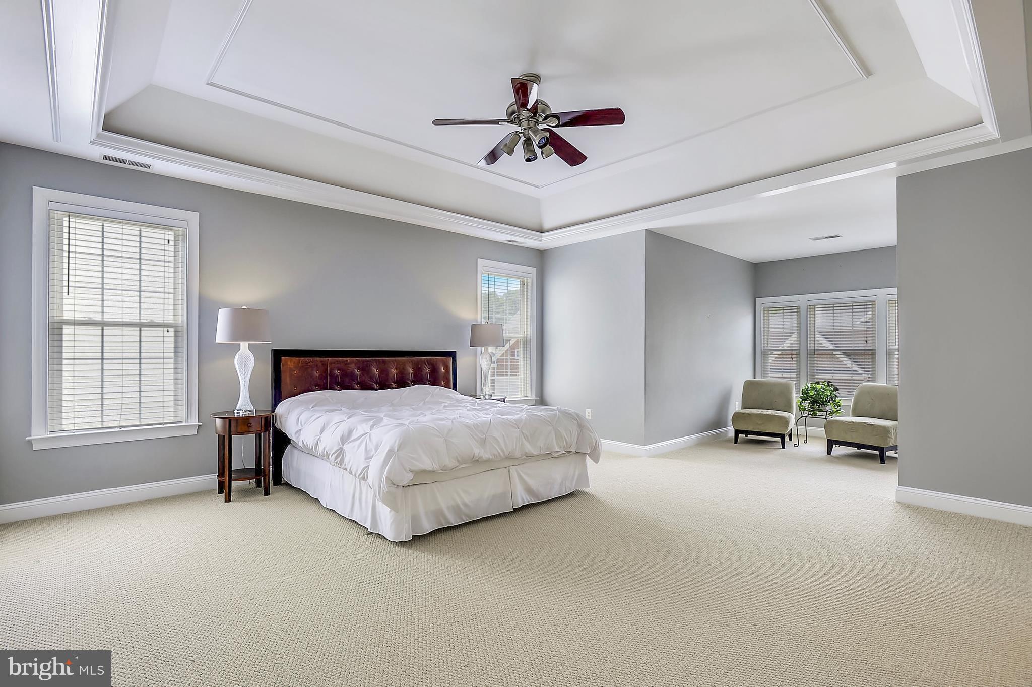 4855 Muddler Way Fairfax, VA 22030 - Photo 16 of 30 a spacious bedroom with a bed and a window