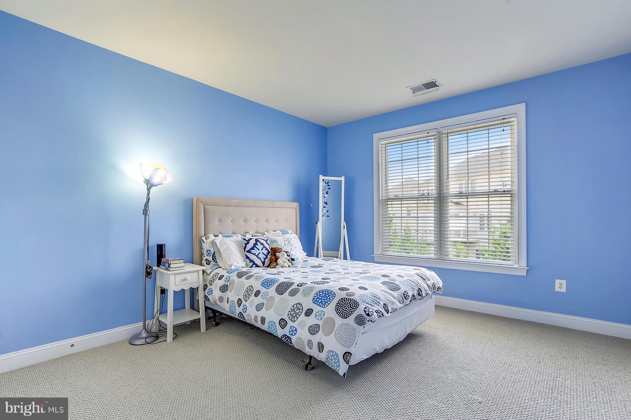 4855 Muddler Way Fairfax, VA 22030 - Photo 20 of 30 a bedroom with a bed and a window