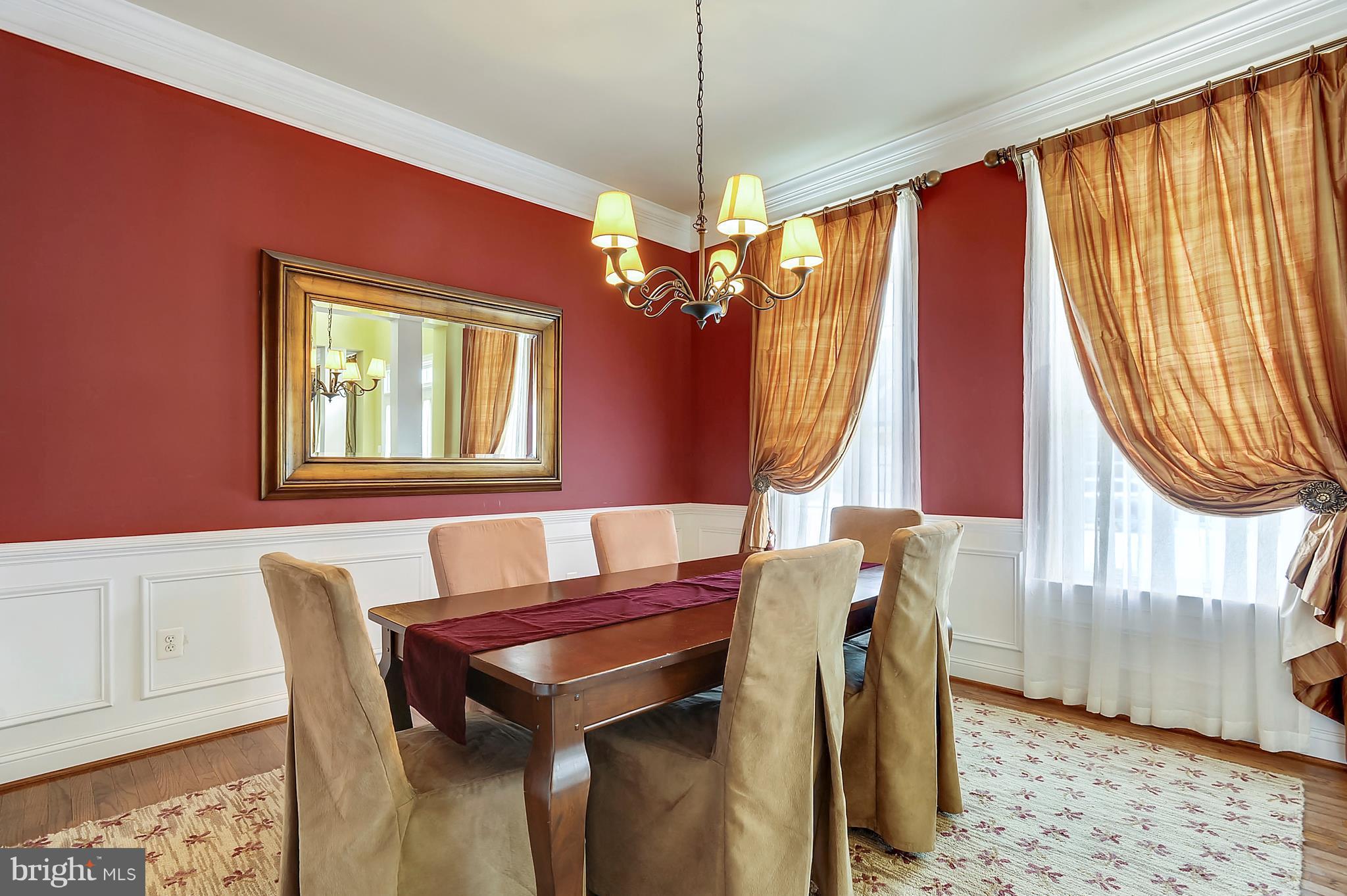 4855 Muddler Way Fairfax, VA 22030 - Photo 3 of 30 a dining room with furniture and a chandelier