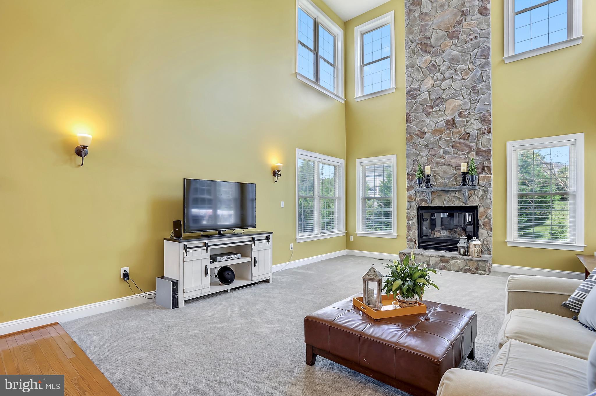 4855 Muddler Way Fairfax, VA 22030 - Photo 6 of 30 a living room with furniture and a fireplace